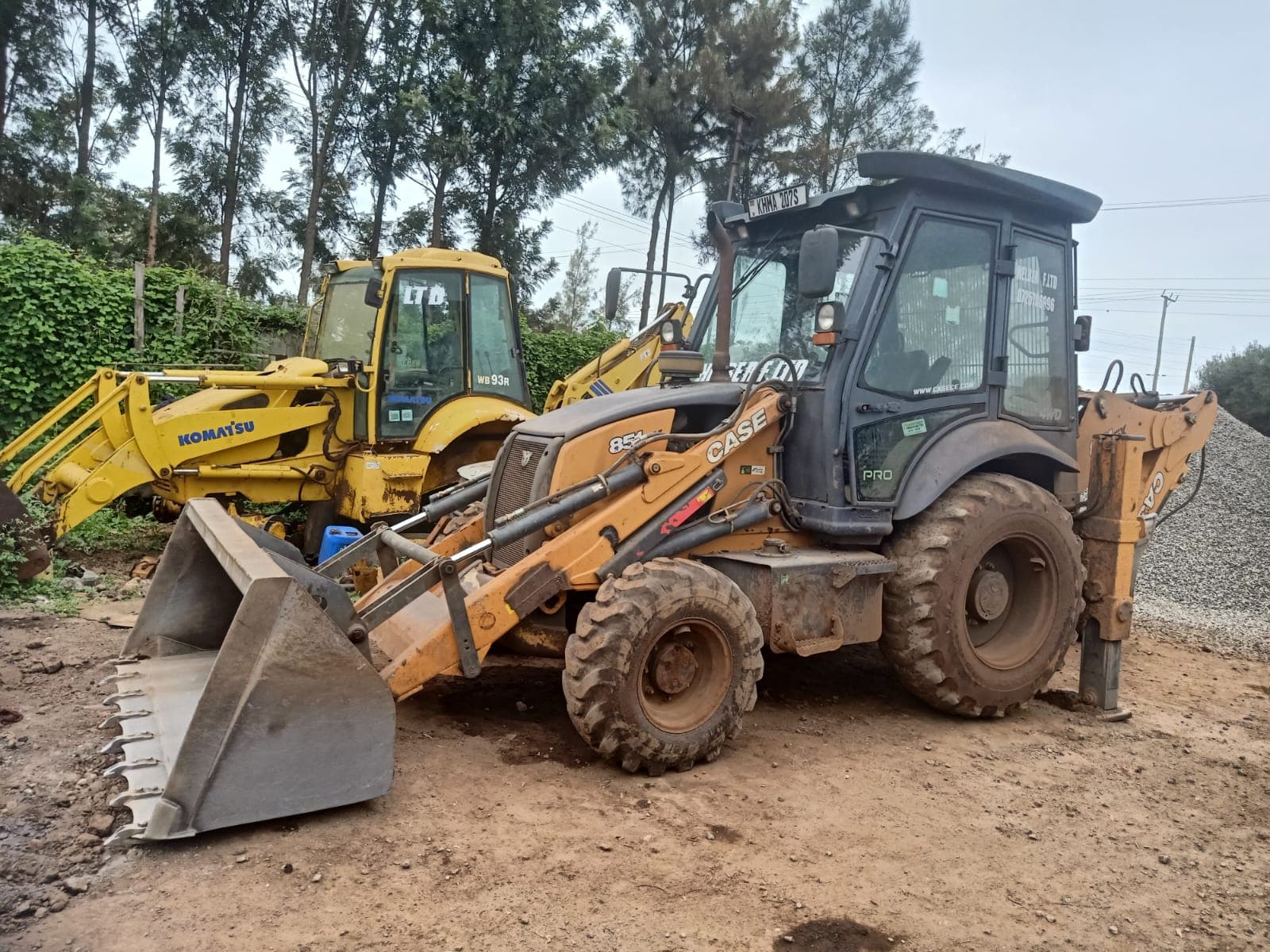 Nelberfarm backhoe loaders parked in the equipment yard