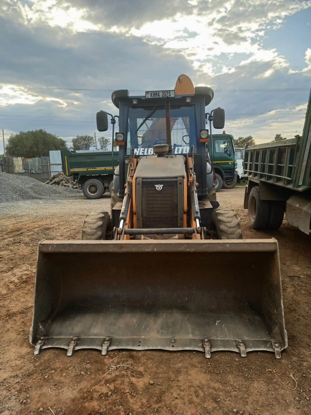 Nelberfarm backhoe loader, rear view in the yard