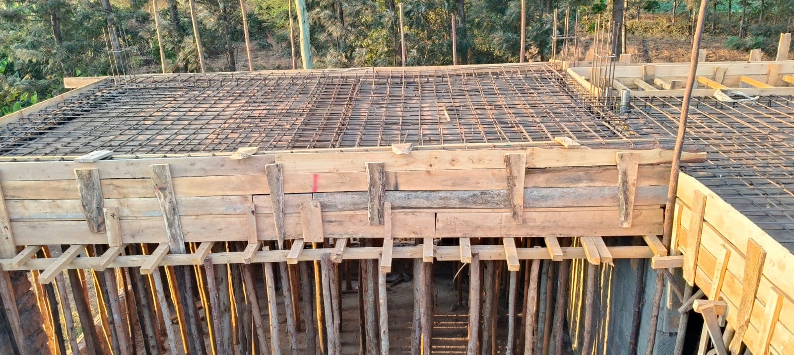 Aerial view of roof slab rebar mesh and timber formwork