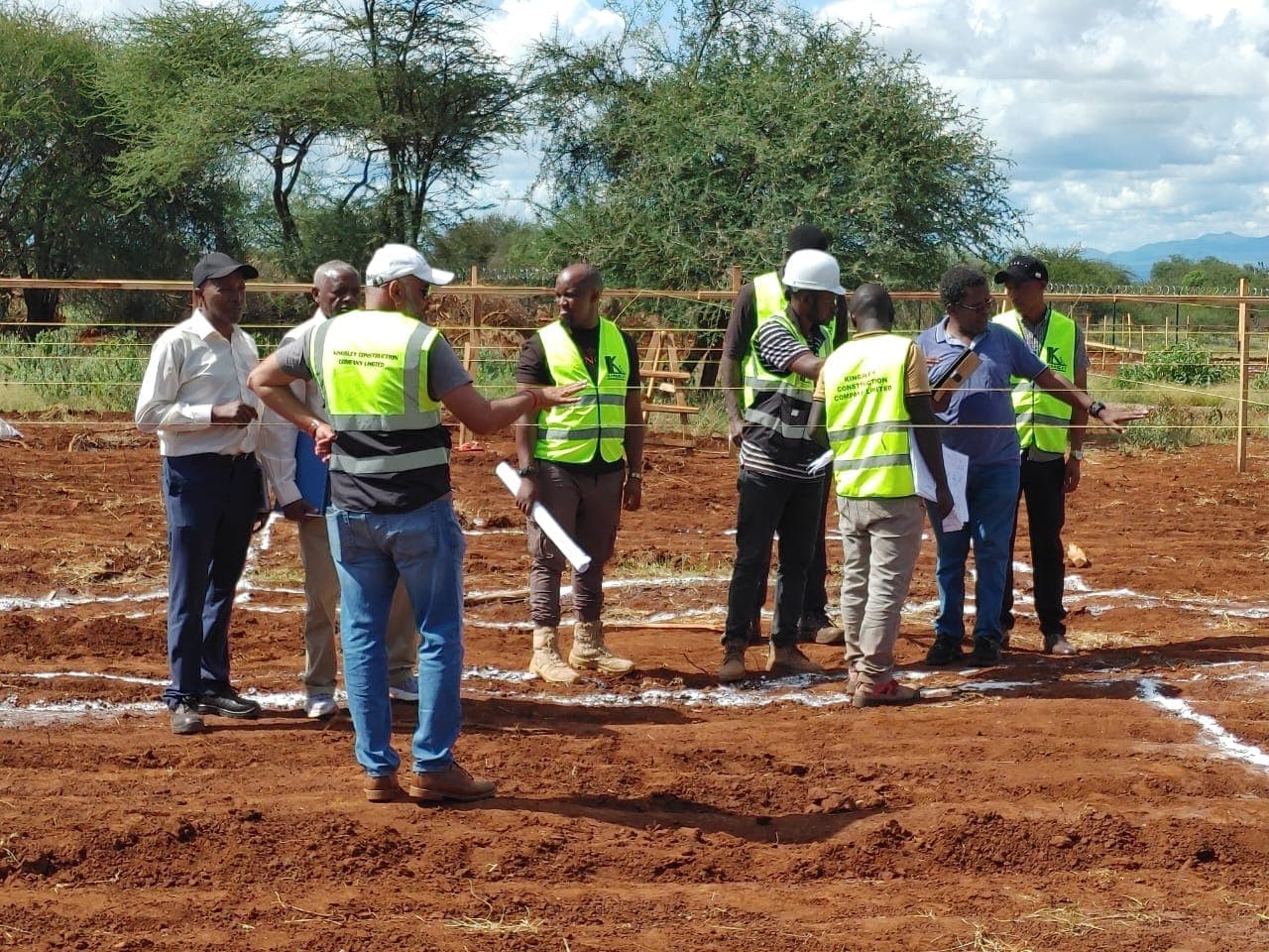 Site team walking out a foundation layout