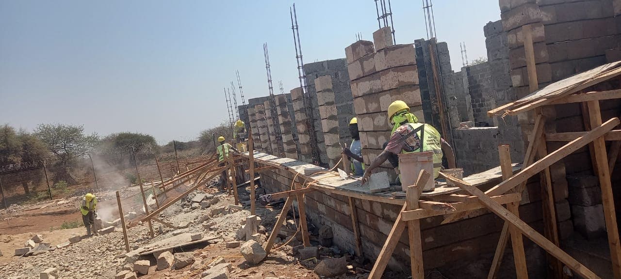 Blockwork rising on a foundation with rebar columns